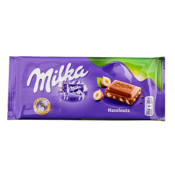 Milka Noisette alpska mlečna čokolada sa kremastim filom od lešnika - Slika 1